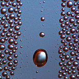 Gotas de agua iluminadas con luz de diodos